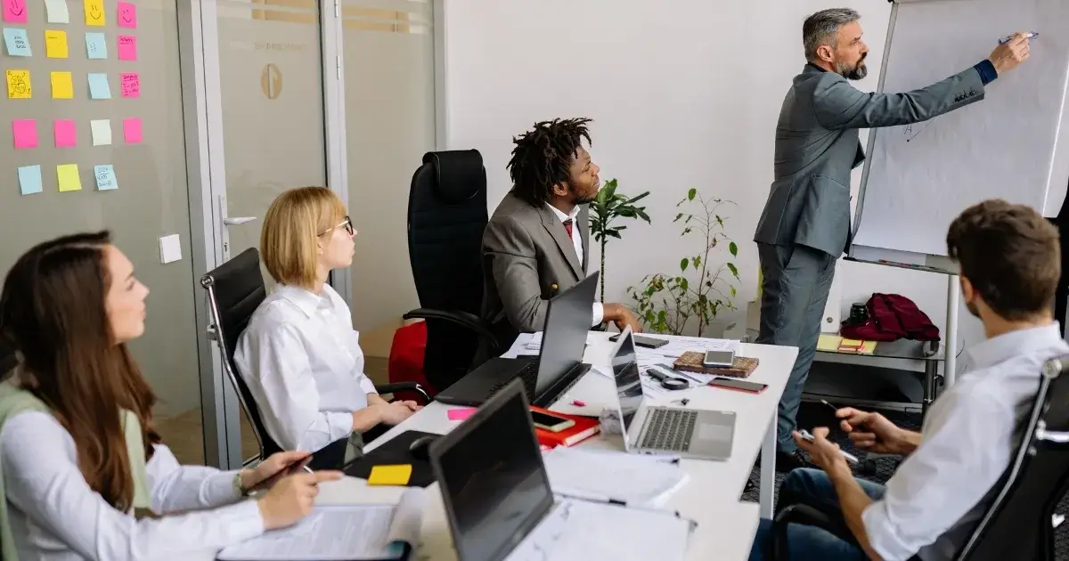 Business professionals meeting in a modern office supported by a commercial cleaning service near me.