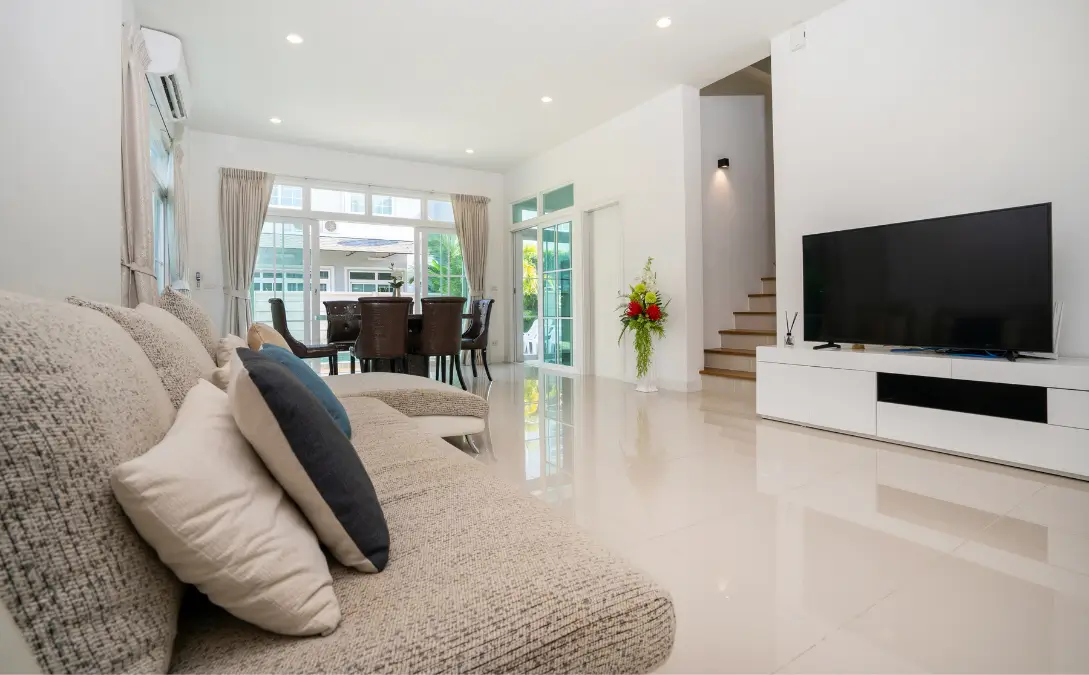 Clean living room illustrating what causes dust in a house and how regular cleaning helps control buildup